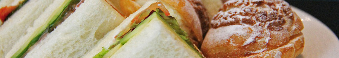 Eating Sandwich at Winona Sandwich Company restaurant in Winona, MN.
